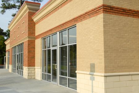 Commercial pressure washing in tinley park il restoring high traffic retail sidewalks and entryways