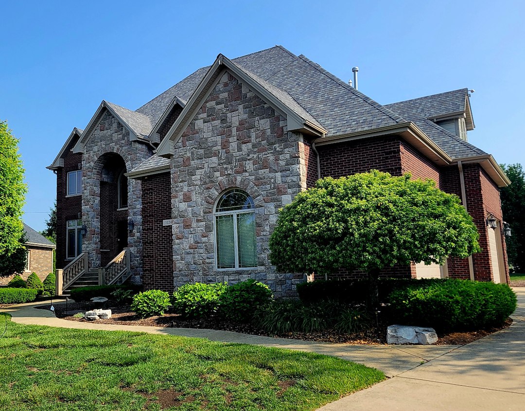 Full exterior cleaning.  House wash, Limestone ledges,  stairs,rails, deck wash,surface clean garage floor drive way and patio. Windows washed